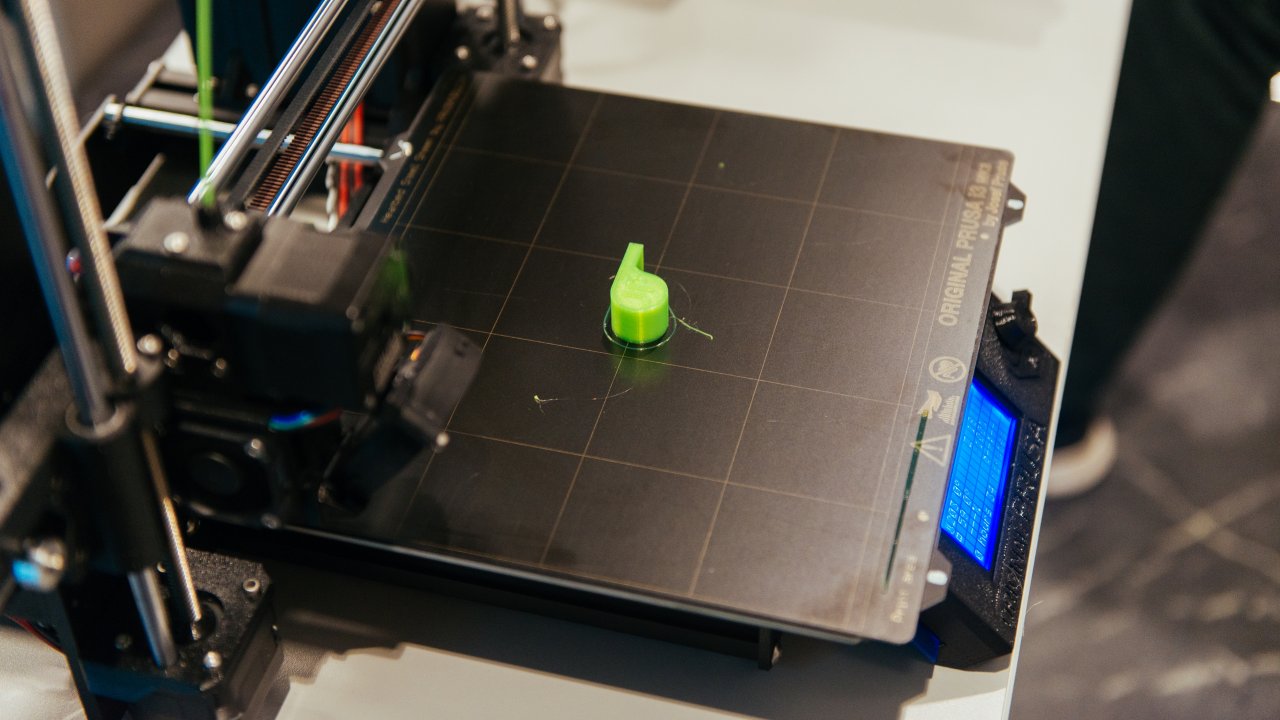 During the 3D-printing workshop several items were printed, among them a green whistle, to display what could be done