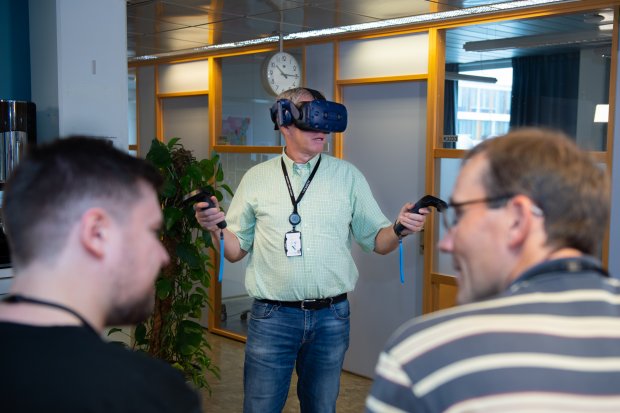 Man wearing a VR headset in an office